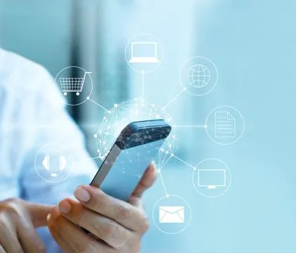 Man using mobile payment, holding circle global and icon customer network Foto stock