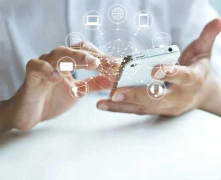 Man using mobile payments, holding circle global and icon customer network Fotos de archivo