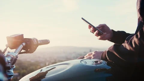 Man using mobile phone and texting or googling on social conected to internet 4g Stock Footage 102687451