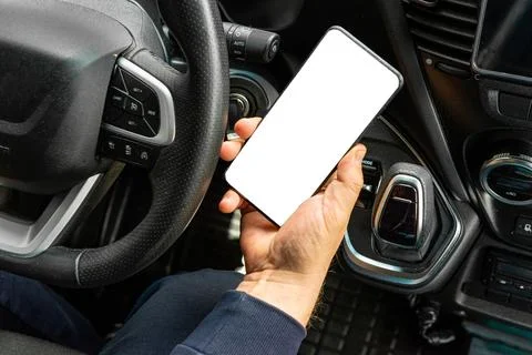 Man using mobile phone with blank mockup screen Foto stock
