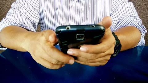 Man using mobile phone in cafe Stock Footage 93061683