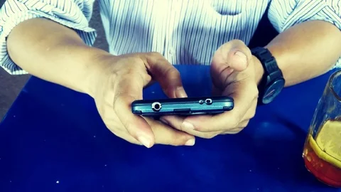 Man using mobile phone in cafe Stock Footage 93061698