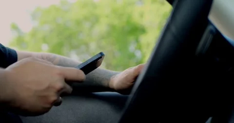 Man using a mobile phone to check email for work or text SMS messages. Stock Footage 313951192