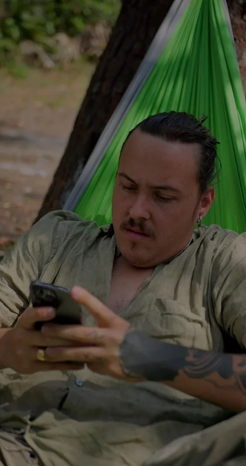 Man Using A Mobile Phone To Check Email Or Text SMS Relaxing... Stock Footage 331820869