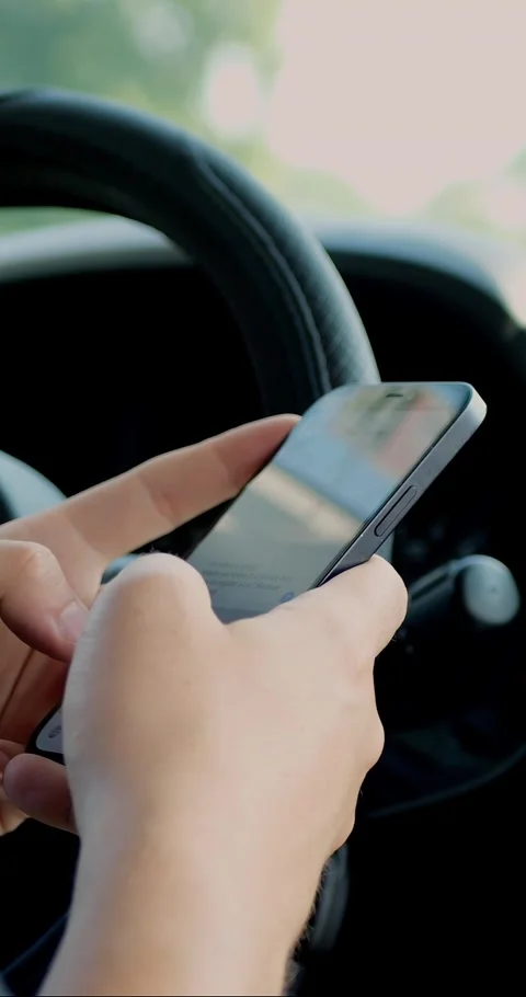 Man using a mobile phone to check email for work or text SMS... Vidéo 344454927