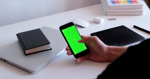 Man using mobile phone chroma key, green screen with markers Stock Footage 126996123