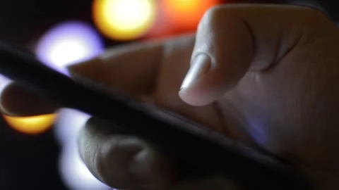 Man using mobile phone for communication. phone message in a night city. 스톡 동영상 220269462