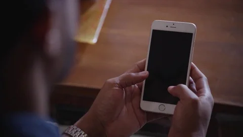 Man using mobile phone at home Stock Footage 83185125