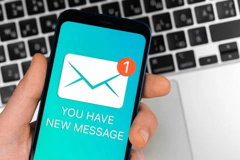 Man using mobile phone with new message icon and notification. Business commu Stock Photos