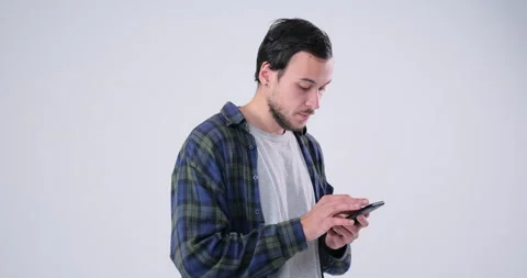 Man using mobile phone over background Stock Footage 143940854