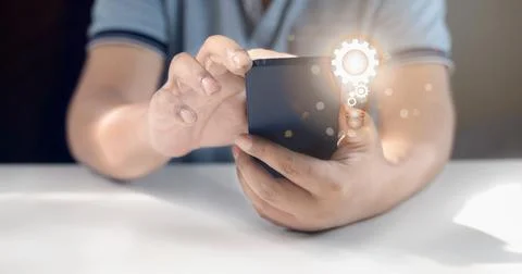Man using mobile phone to search for information Foto stock
