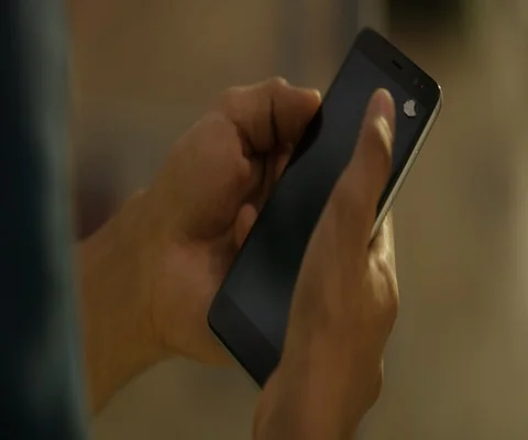 Man using a mobile phone- Shot on RED 5K in 2.35:1 Stock-Footage 91132285