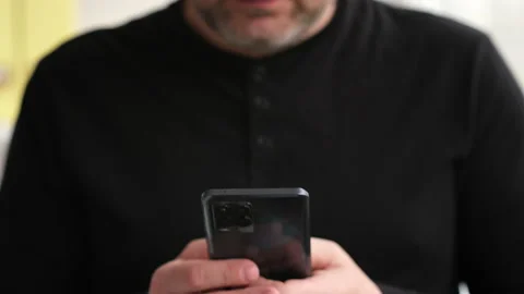 Man using mobile smart phone close up. Person typing phone message on smartphone Stock Footage 237797748