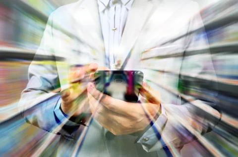 Man using mobile smart phone on super market background as Double Exposure Stock Photos