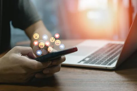 Man using mobile smart phone Social media chat message and Marketing networ.. Stock Photos