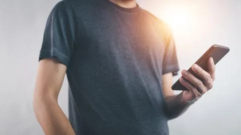 Man using mobile smartphone,technology mobile phone concept Stock Photos