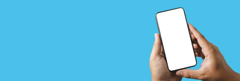 Man using  Mock up a Cell Phone With Blank Screen space banner Foto stock