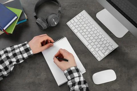 Man using modern computer for studying at table, top view. Distance learning Stock Photos