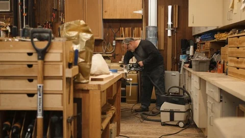 Man using morticer machine tool in workshop Stock Footage 102045481