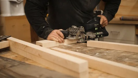 Man using morticer machine tool on board Stock Footage 102045482