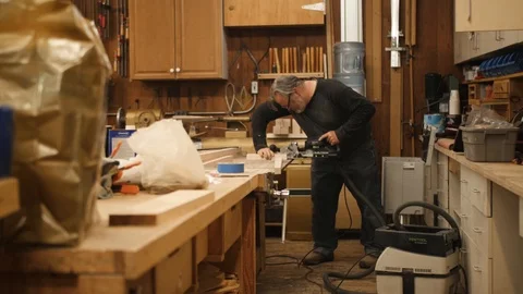 Man using morticer machine tool in workshop Stock Footage 102045490