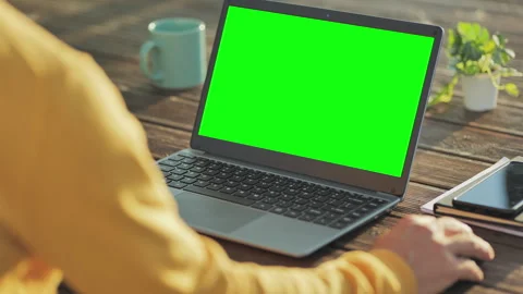Man using mouse scrolling laptop green screen computer outdoor Stock Footage 293097964