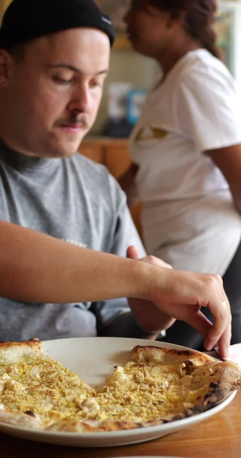 Man using a napkin after finishing his meal. Stock Footage 279817066
