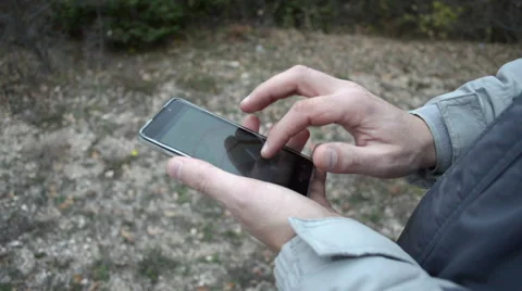 Man using navigation on smartphone Stock Footage 43968841