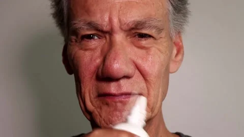 Man using a Nose Spray Video stock 231510670