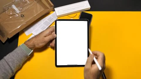 Man using Notes App on latest iPad pro with Apple Pencil Stock Photos