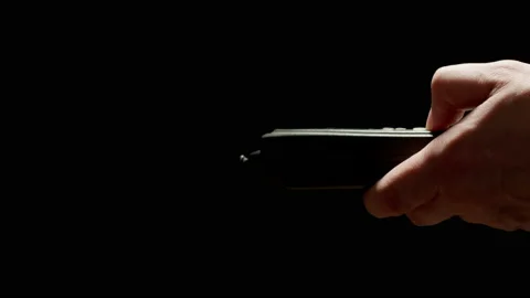 Man using old mobile phone. Outdated push button cellphone. Close up. 스톡 동영상 142914825