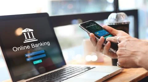 Man using online banking with credit card on touch screen device. Mobile ba.. Stock Photos