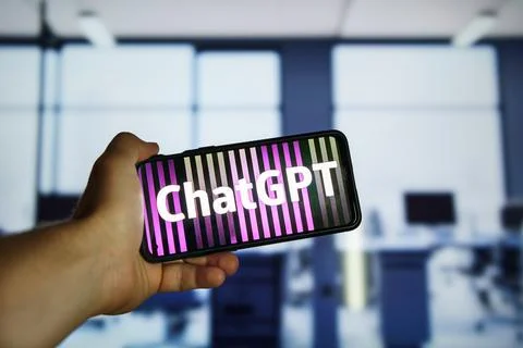 Man using Openai Chatgpt chatbot app at the office Stock Photos