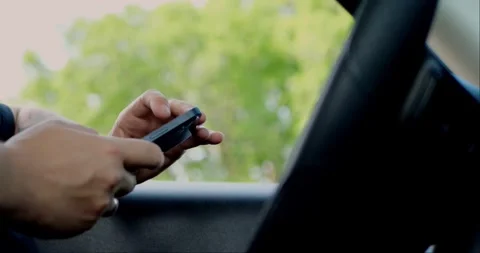 Man using or holding a mobile phone to check email for work or text SMS. Stock Footage 313951179