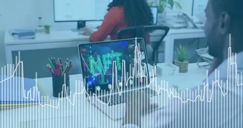 Man using pad and causing waveform overlay rising while managing laptop visuals Stock Footage 331046097