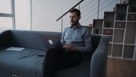 Man using pc computer and sitting at home Stock Footage 111430575