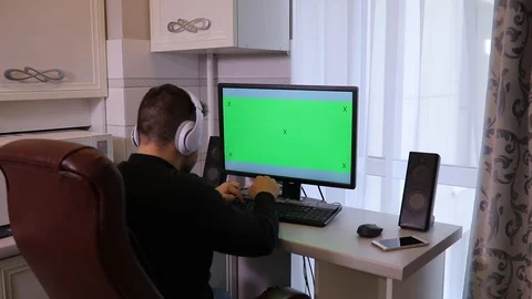 Man using PC computer with green screen ... | Stock Video | Pond5