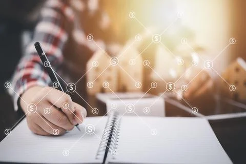 Man using pen touch graph market stock and light bulb with people icon on the Stock Photos