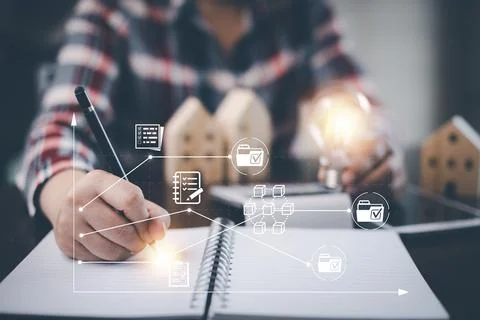 Man using pen write project and  folder of document Management System,  onlin Stock Photos