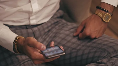 Man using phone and his staff is on the table Stock Footage 96299227
