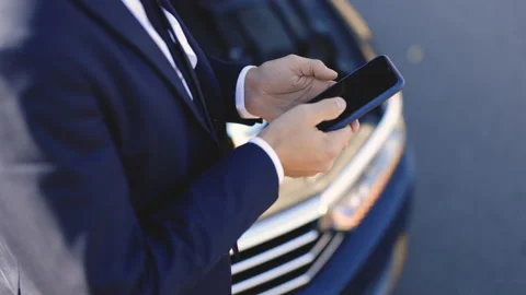Man is using the phone in asking for help when his car is broken. Upset Stock Footage 194754189