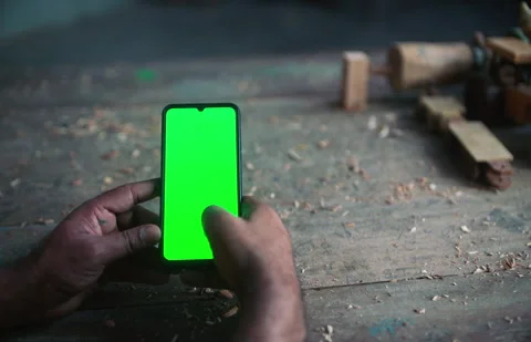 Man using phone with green screen Stock Footage 295608060