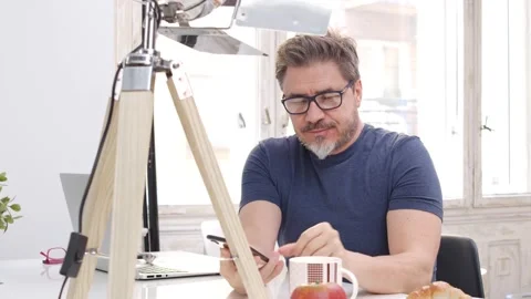 Man using phone at home Stock Footage 149201582