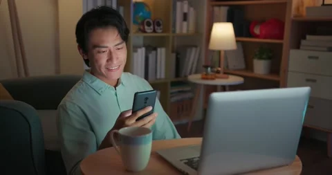 Man using phone at home Stock Footage 160261334