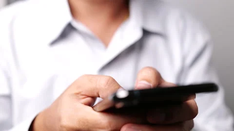 Man using phone for searching data and social media on internet Stock Footage 158166237