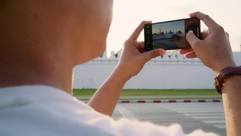 Man using phone for take a picture while holiday trip at Bangkok, Thailand. Stock Footage 108220630