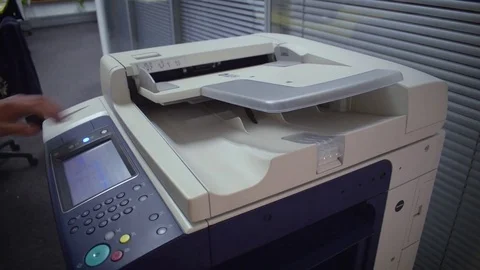 Man using a photocopier Stock Footage 71042307