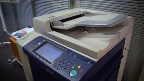 Man using a photocopier Stock Footage 71042476