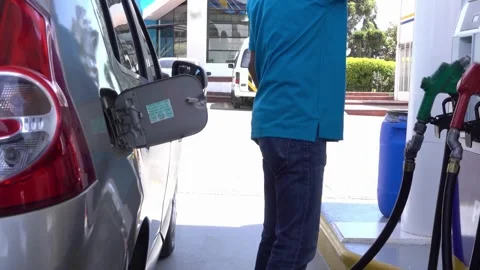 Man using pistol Petrol station, transportation and refueling concept. Hand.. Stock Footage 256723968