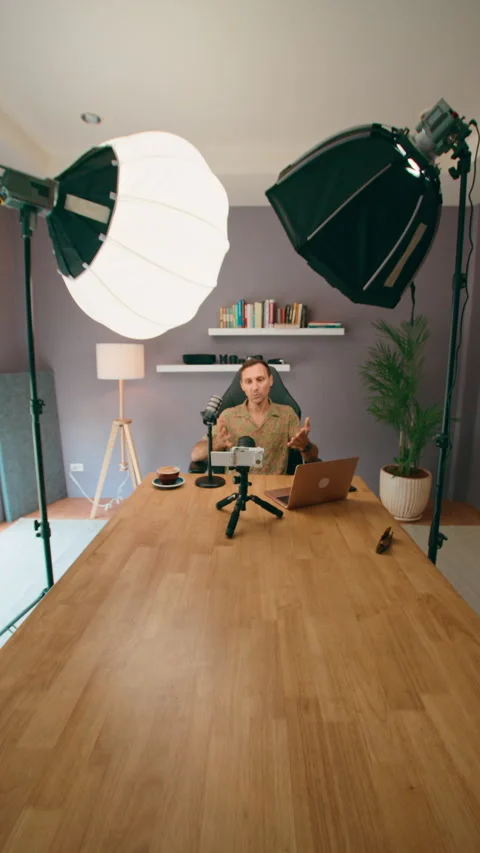 A man is using professional equipment to record a video podcast in a home studio 스톡 동영상 276341373